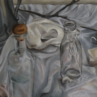 Two empty jugs on a white clothe
